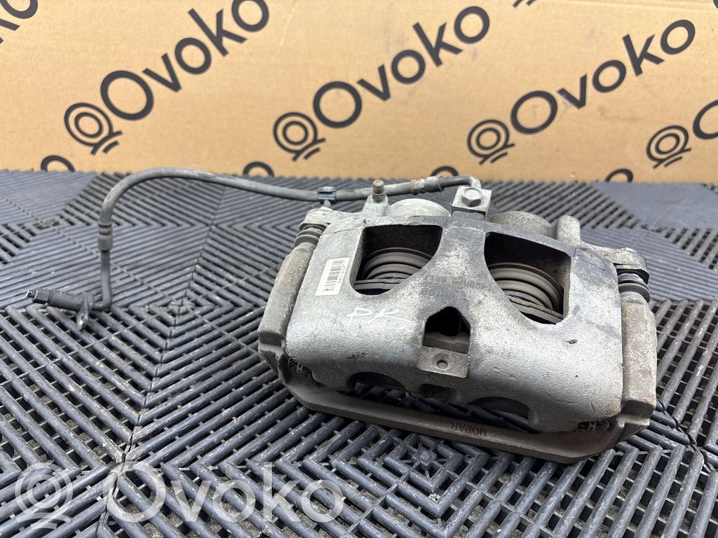 Caliper de freno delantero