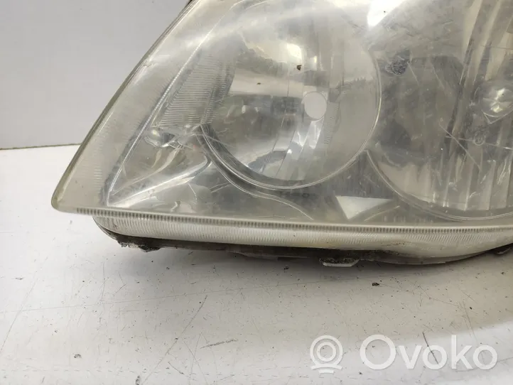 Toyota Corolla Verso E121 Lampa przednia 9922679004