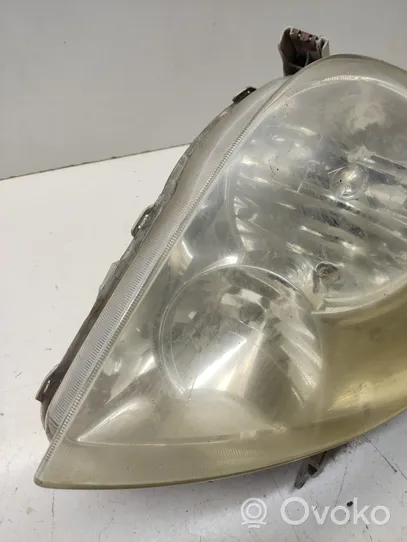 Toyota Corolla Verso E121 Lampa przednia 9922679004