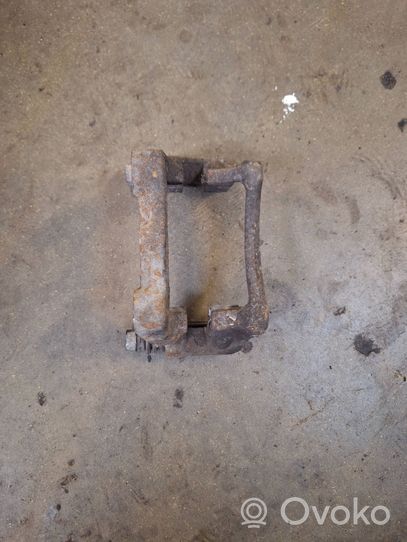 Volkswagen Touran I Brake caliper pad carrier rear 