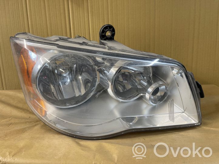 Chrysler Voyager Lampa przednia 05113336AD