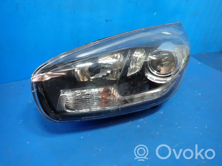 KIA Carens III Lampa przednia 