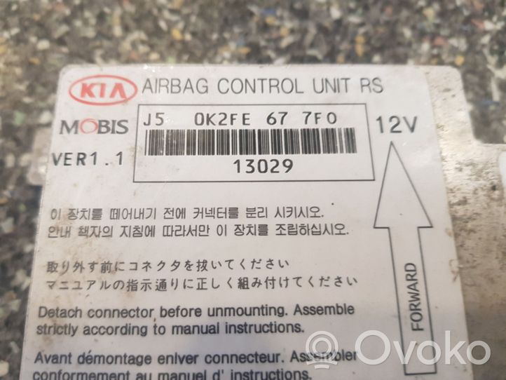 Mitsubishi Colt Sterownik / Moduł Airbag 0K2FE677F0