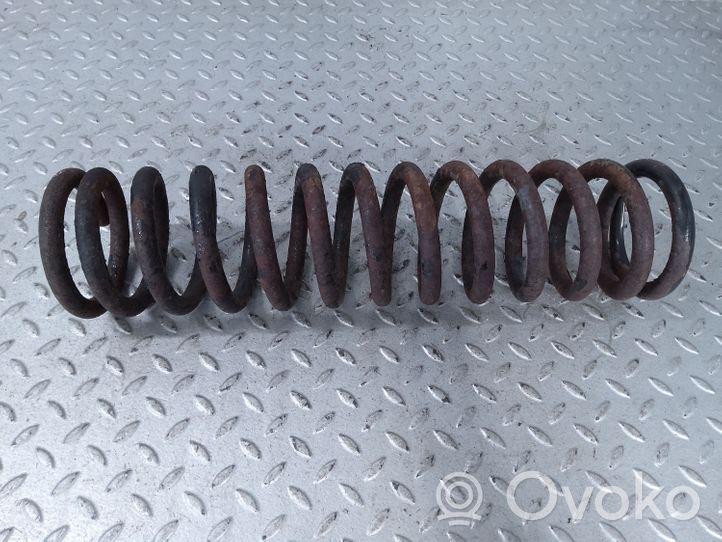 Mercedes-Benz 200 300 W123 Front coil spring A1233213904