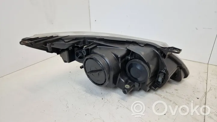 Saab 9-3 Ver2 Lampa przednia 12770137