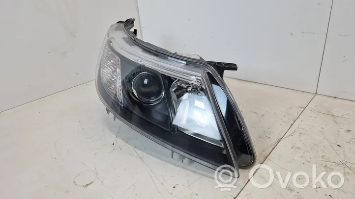 Saab 9-3 Ver2 Lampa przednia 12778684