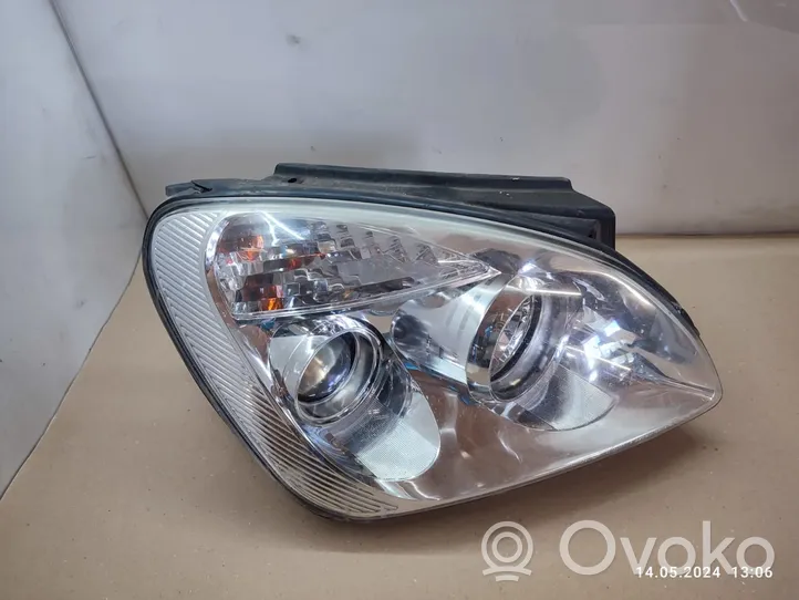 KIA Carens II Lampa przednia A044936