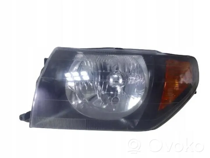 Mitsubishi Pajero Pinin Lampa przednia MITSUBISHI