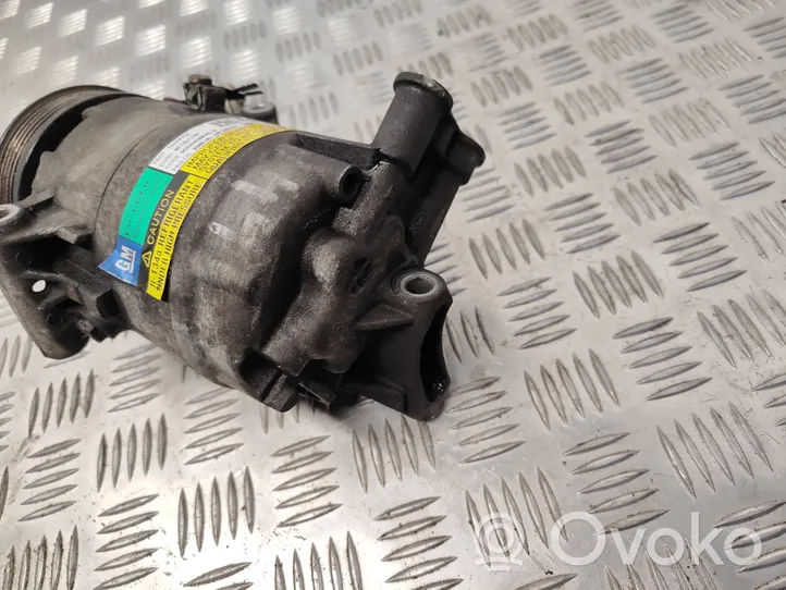 Opel Zafira B Air conditioning (A/C) compressor (pump) 13124752