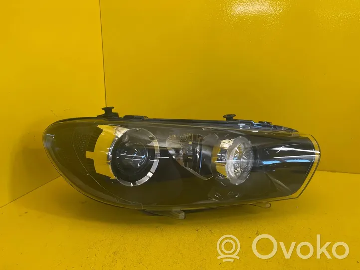 Volkswagen Scirocco Lampa przednia 1K8941032L