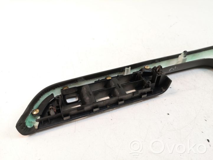 Nissan X-Trail T30 Front door window switch trim 80948EQ300