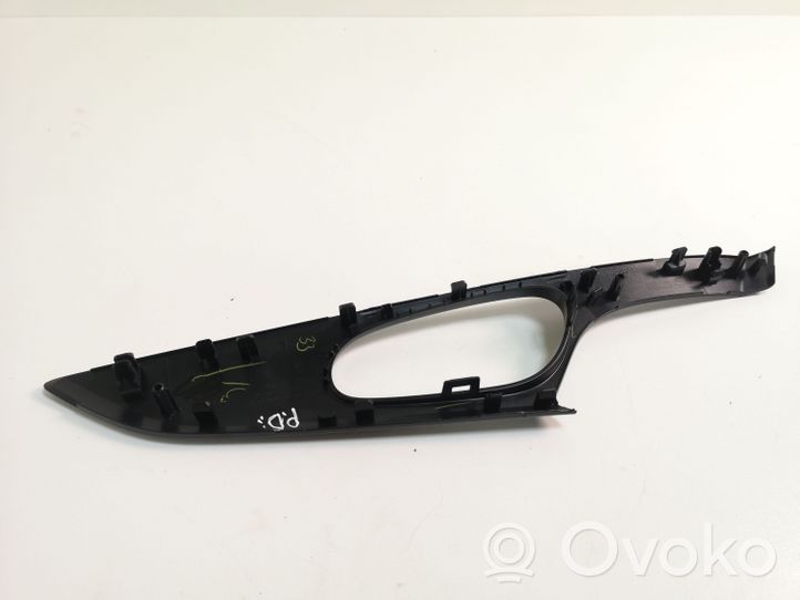 Nissan Qashqai Obudowa klamki wewnętrznej drzwi przednich 806824EA1AX