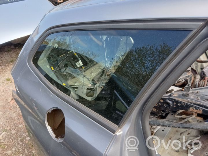 Peugeot 308 Szyba karoseryjna tylna 