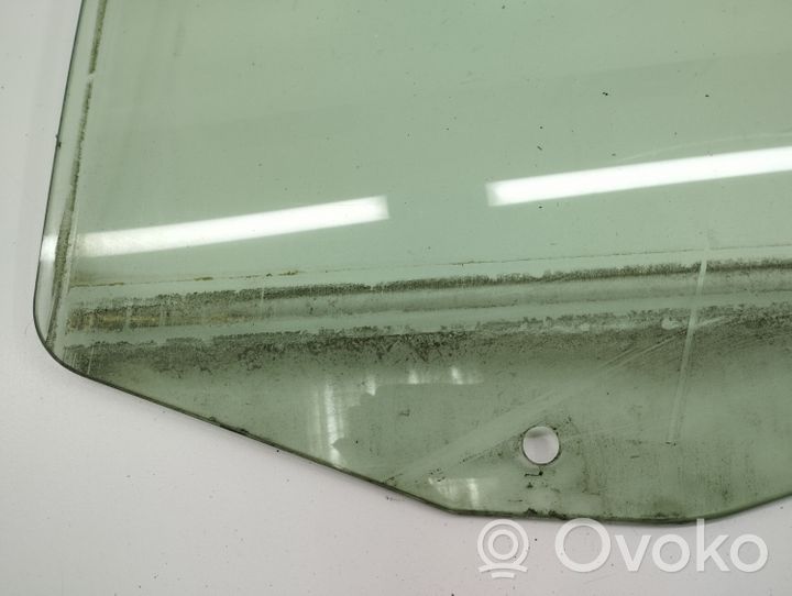 Chrysler Voyager Front door window glass four-door 