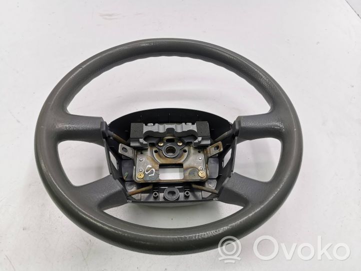 KIA Carens I Steering wheel 0K2FB32980