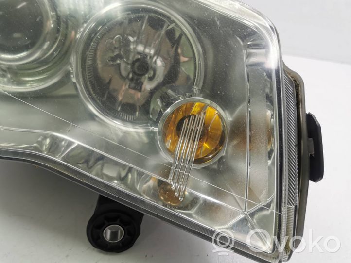 Chrysler Voyager Lampa przednia 05113342AD