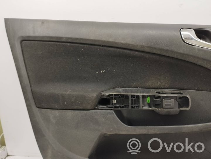 Opel Corsa D Обшивка передней двери AJF56011003