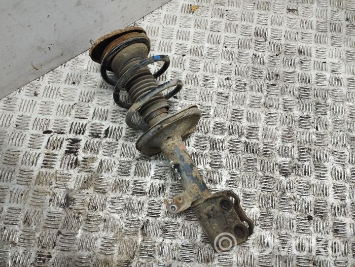 Toyota Avensis T250 Front shock absorber with coil spring 