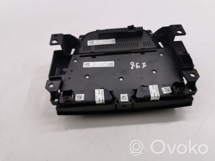 Opel Astra J Central console control unit 13346050