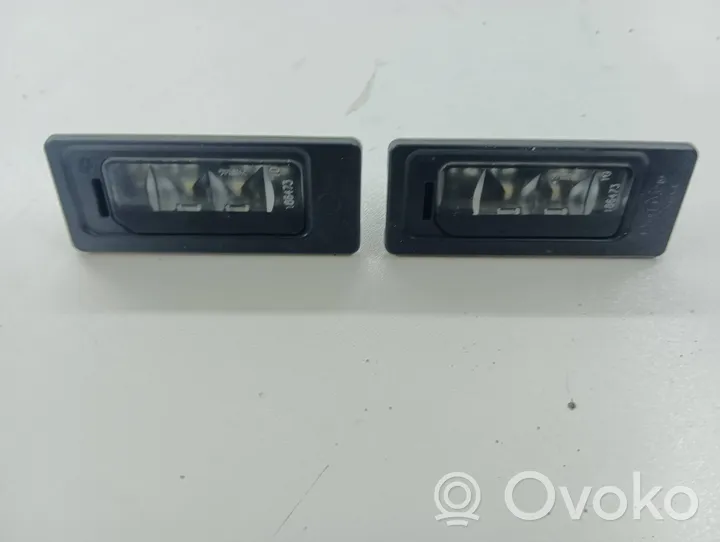 Volkswagen PASSAT B8 Lampa oświetlenia tylnej tablicy rejestracyjnej 3AF943021A