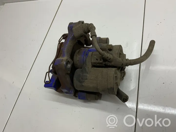 Volkswagen Golf VII Caliper del freno trasero 