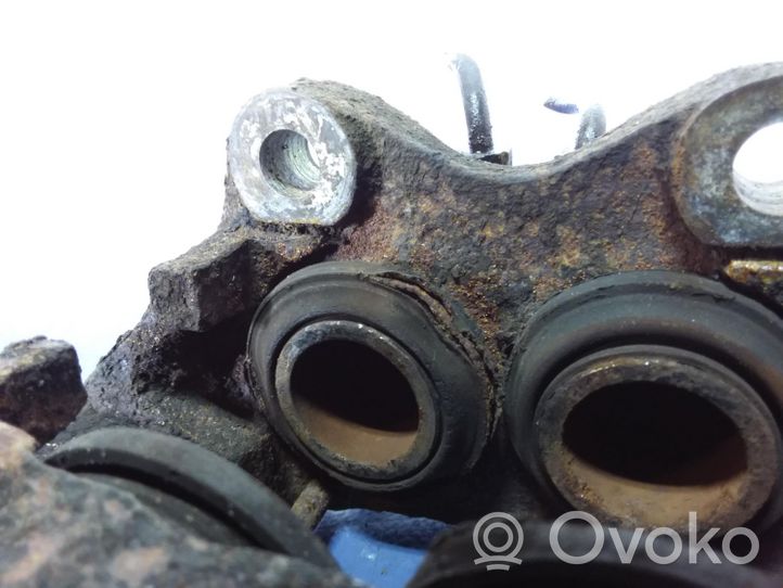 Volvo 240 Caliper de freno delantero 