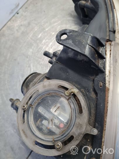 Chrysler Voyager Lampa przednia 46536B