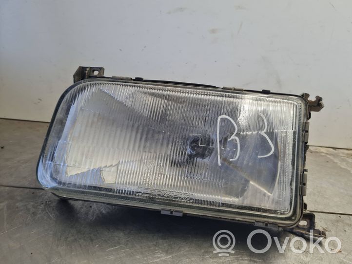 Volkswagen PASSAT B3 Lampa przednia 13347900