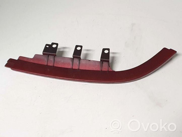 Mazda 323 F Rivestimento sotto il faro/fanale K2443