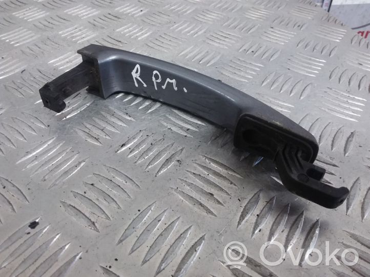 Opel Zafira B Front door exterior handle 