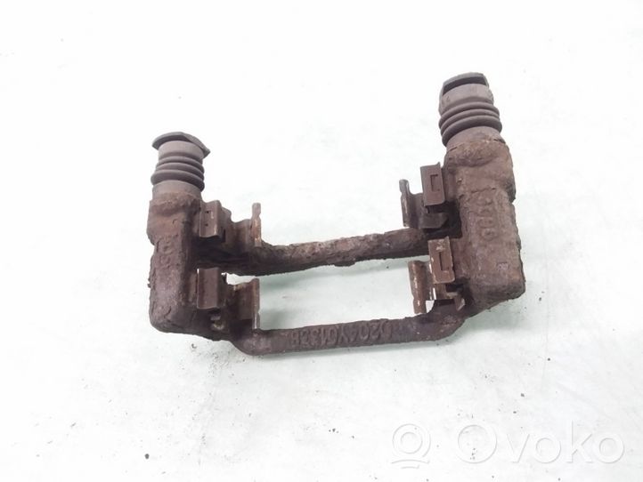 Toyota Avensis T250 Supporto della pinza del freno posteriore 0204Y01338