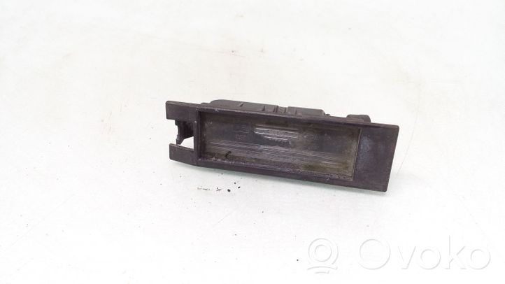 Opel Corsa C Lampa oświetlenia tylnej tablicy rejestracyjnej 09164143