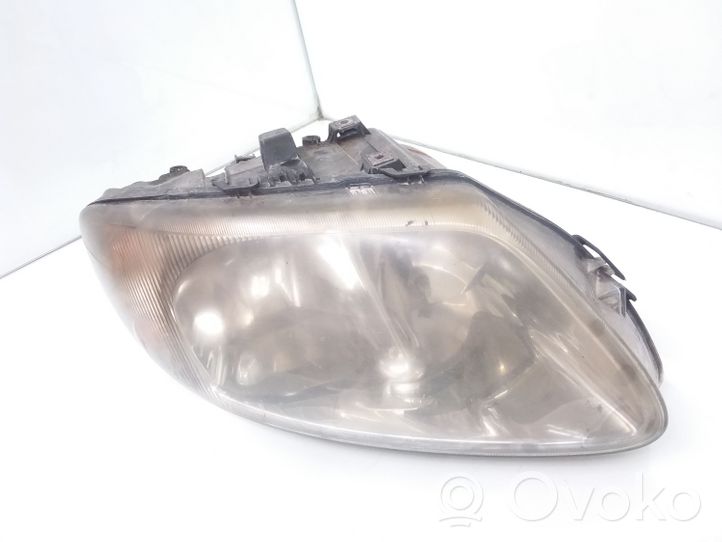 Chrysler Voyager Lampa przednia 04857702AB