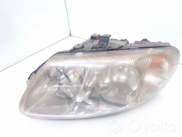 Chrysler Voyager Lampa przednia 04857703AB