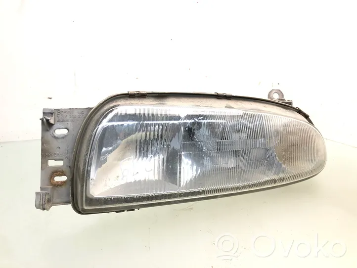 Ford Fiesta Lampa przednia 0301049201