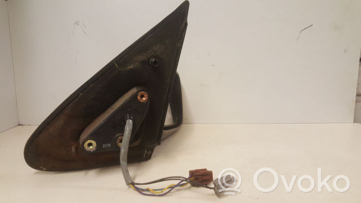 Nissan Almera Front door electric wing mirror 