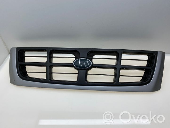 Subaru Forester SF Maskownica / Grill / Atrapa górna chłodnicy 91065FC010WG