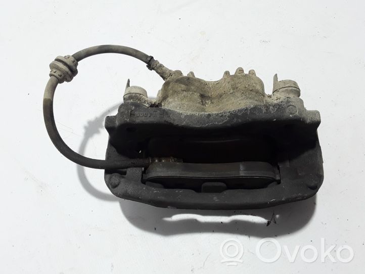 Opel Movano B Front brake caliper 410110092R