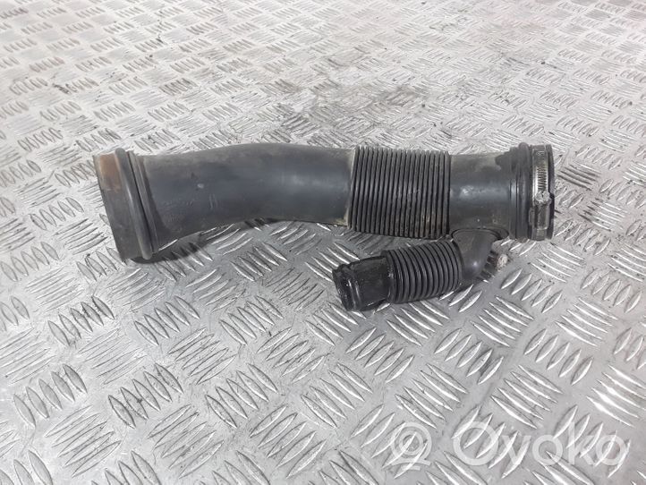 Volkswagen PASSAT B5 Parte del condotto di aspirazione dell'aria 06B129627