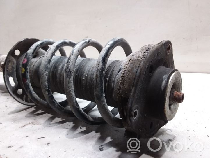 Volkswagen Touran II Front shock absorber with coil spring 1T0412015PQ