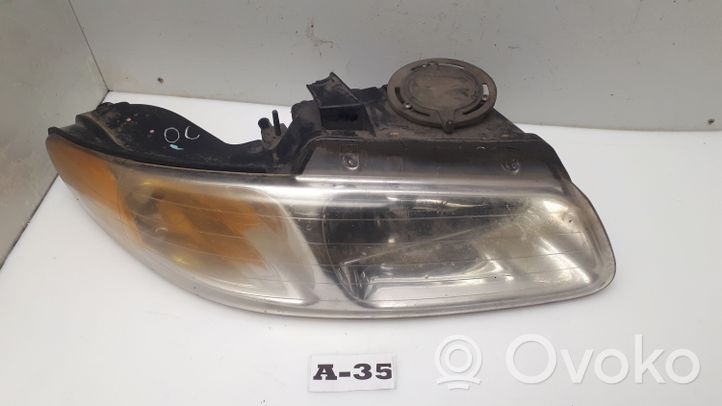 Chrysler Voyager Lampa przednia 