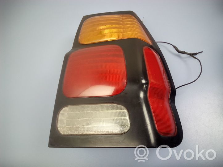 Mitsubishi Pajero Sport I Lampa tylna MR495798