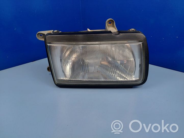 Opel Frontera B Lampa przednia 1305235379