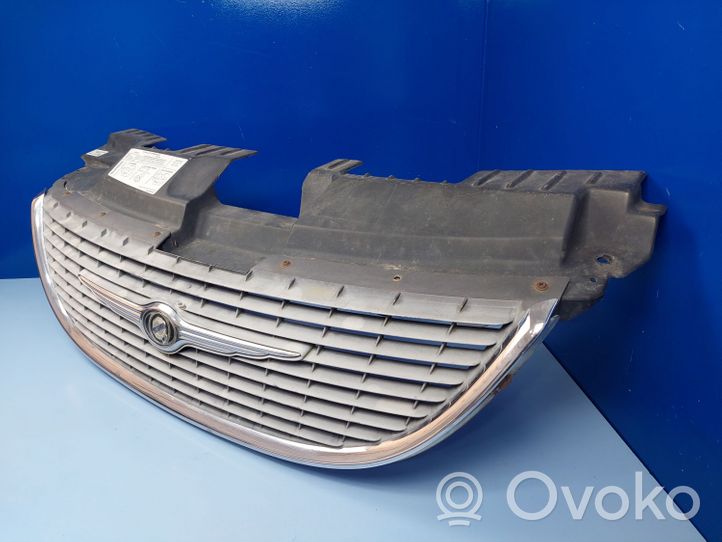 Chrysler Voyager Maskownica / Grill / Atrapa górna chłodnicy 04857410AC