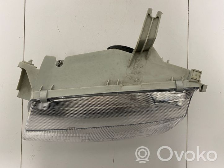 Mazda 323 Lampa przednia 082161126M