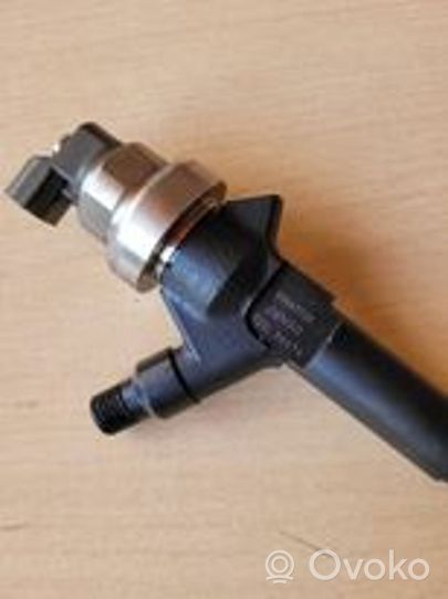 Opel Astra J Injecteur de carburant 55567729