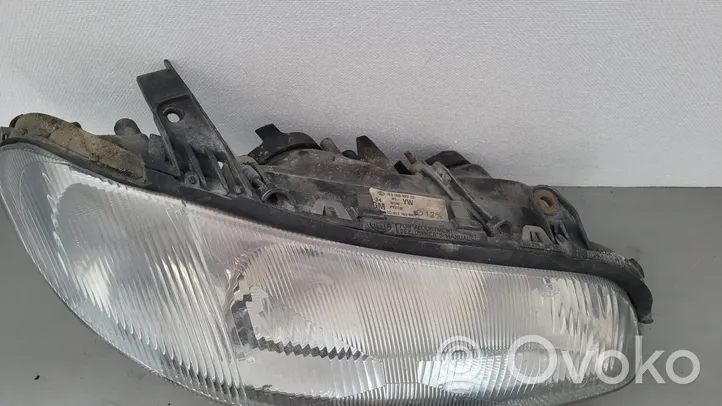 Opel Omega B1 Lampa przednia 90457762