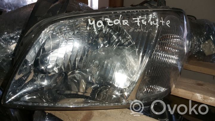 Mazda Tribute Передняя фара 304681573617