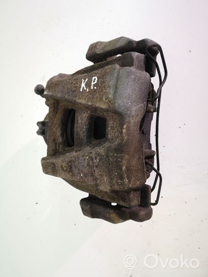 Volkswagen PASSAT B7 USA Front brake caliper 