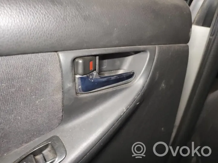 Toyota Corolla E120 E130 Klamka wewnętrzna drzwi tylnych 